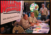 Delbert Stover, Dennis Dunlap and Denny Bohls work the booth at the 2009 Rapid City Sports Show.