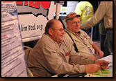 Selling banquet and raffle tickets and signing up new members at the 2009 Rapid City Sports Show are (from left to right in SDWU Shirts) Delbert Stover, Dennis Dunlap, and Denny Bohls.