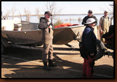 Volunteers preparing to assist the GF&P with a fish tagging project at Orman Dam are: Mike Johnson (left), Nancy Smidt (forground), and Rick Zimbelman. Gene Galinat (West River Fisheries Biologist) at far right.