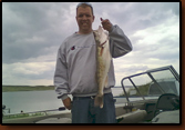 Rollin Tiggelaar fishing north of Pierre.