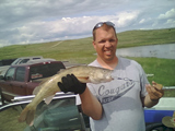 Rollin Tiggelaar and his catch which is over 5 lbs taken June 11 - 12 north of Pierre.