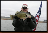Brenda Johnson caught this 21 inch, 6 lb Largemouth Bass off the official's boat in between measuring tournament angler's fish.