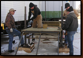 from left to right: Denny Bohls, Mike Johnson, Dan Amen, and Ken Edel working on the Dock project.