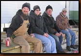 Volunteers (from left to right) Mike and Brenda Johnson, Ken Edel, and Denny Bohls take a break from working on the dock project.