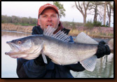 Kevin holding his trophy catch.
