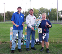 Aaron Holland of SDSU accepts the 42 new rods/reels donated by the Rapid City Chapter of SDWU.