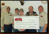 The winners of our of the Tobin lake fishing trip we gave away at our last banquet. Larry Jobe (the winner. gray beard) gave the trip to Mike and Ethan Marsland the night of our banquet. Denny Bohls and Lee Jensen is presenting a check for $750.00 to help cover expenses on their trip.