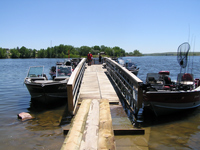 Volunteer's boats line the courtesy dock at Horsehead day use area at the conclusion of the day's fishing.