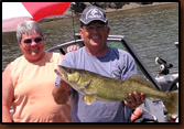 This 31.5 inch Walleye caught Tuesday, June 15th in Oahe by master angler is Jan Plante of North Mankato, MN. She and her husband Larry have
been fishing for 30 years and have never caught a Walleye this big. Picture was taken by Mike Johnson, President of Rapid City Area Chapter.