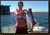 Jena Forsch, daughter of Kevin Forsch with the salmon she caught at Oahe, July 4th, 2010.
